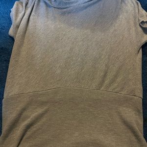 Ladies gray shirt sleeve top with beautiful back lace details.